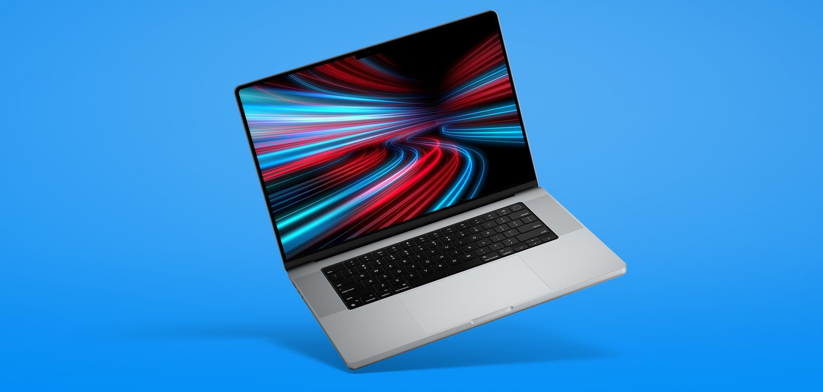 Glasfaser-Tarife buchen Blauer Hintergrund auf dem ein aufgeklappter Laptop abgebildet ist